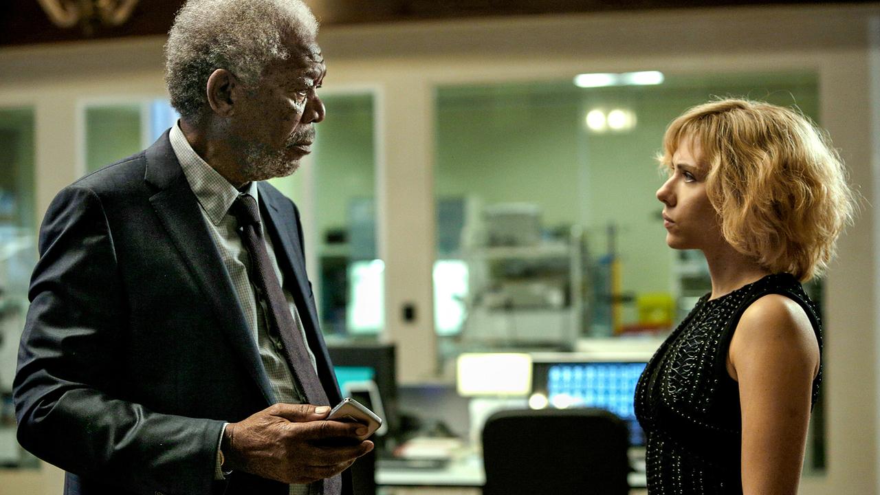 Morgan Freeman (Prof. Norman), Scarlett Johansson (Lucy)