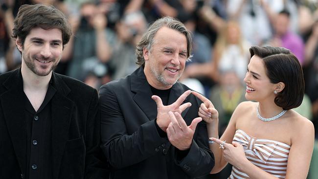 © APA/AFP/Sameer AL-DOUMY Guillaume Marbeck, Richard Linklater, Zoey Deutch