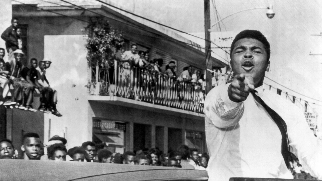 Im Bild: Cassius Clay während einer Parade, Miami, Florida. 14. Dezember 1963.