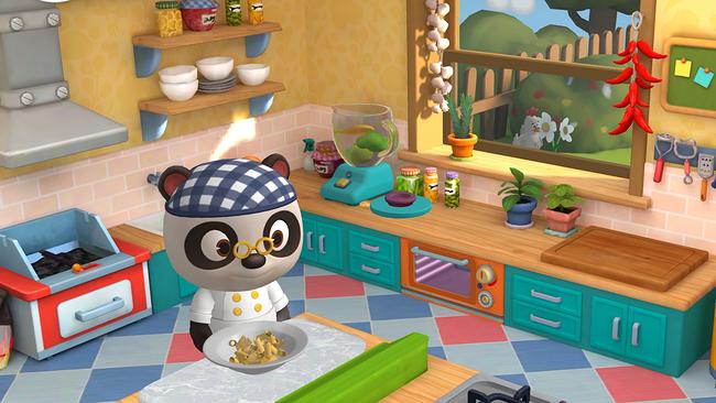 Im Bild: Ein Auszug aus der App. Dr. Panda steht in der Küche und hat einen Teller angerichtet.