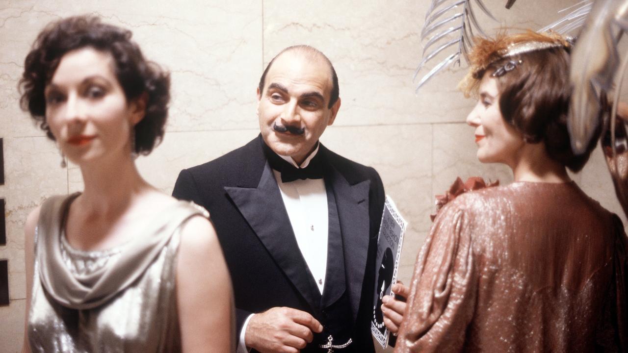 David Suchet (Hercules Poirot) in Tuxido bei einem Party. 