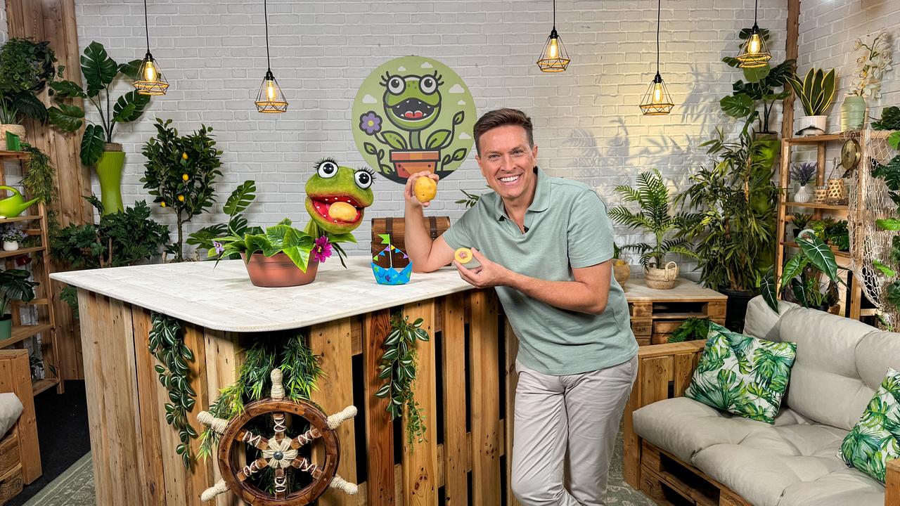 Lila macht sich über Roberts Kartoffeln her.