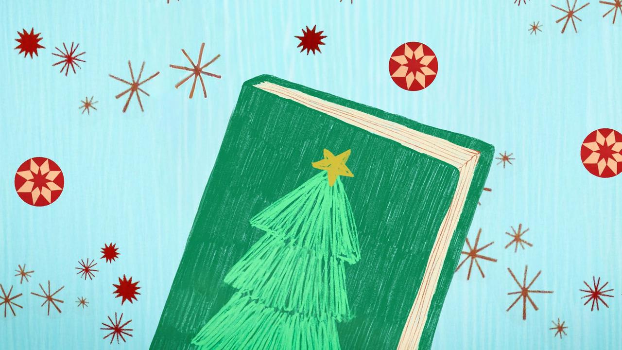 Ein grünes Buch mit einem Christbaum, der einen Stern an der Spitze hat. 