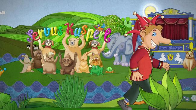Kasperl geht durch eine grüne Landschaft entlang eines Baches. Im Hintergrund sind seine Freunde mit dem Schriftzug Servus Kasperl zu sehen