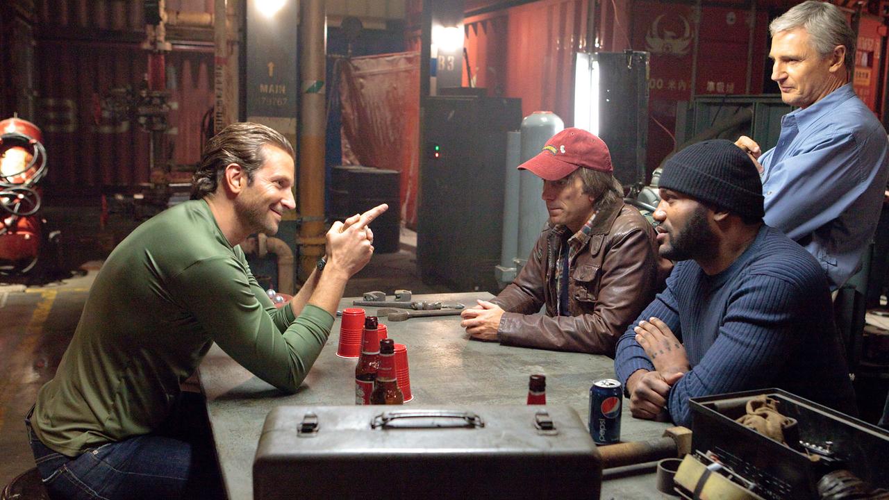 Im Bild: Bradley Cooper (Templeton 'Face' Peck), Sharlto Copley (H.M. Murdock), Quinton 'Rampage' Jackson (B.A. Baracus), Liam Neeson (Col. John 'Hannibal' Smith).