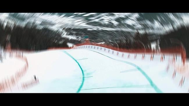 © ORF/WWP Production "Tunnel-Erlebnis" auf der Streif: Ein stark verwischtes Bild zeigt eine verschneite Skiabfahrt mit Sicherheitszäunen, aufgenommen in rasanter Bewegung.