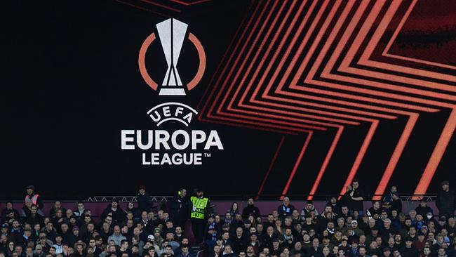 Supporters cheer during the UEFA Europa League quarter final first leg football match between West Ham United and Olympique Lyonnais at The London Stadium, in east London, on April 7, 2022.