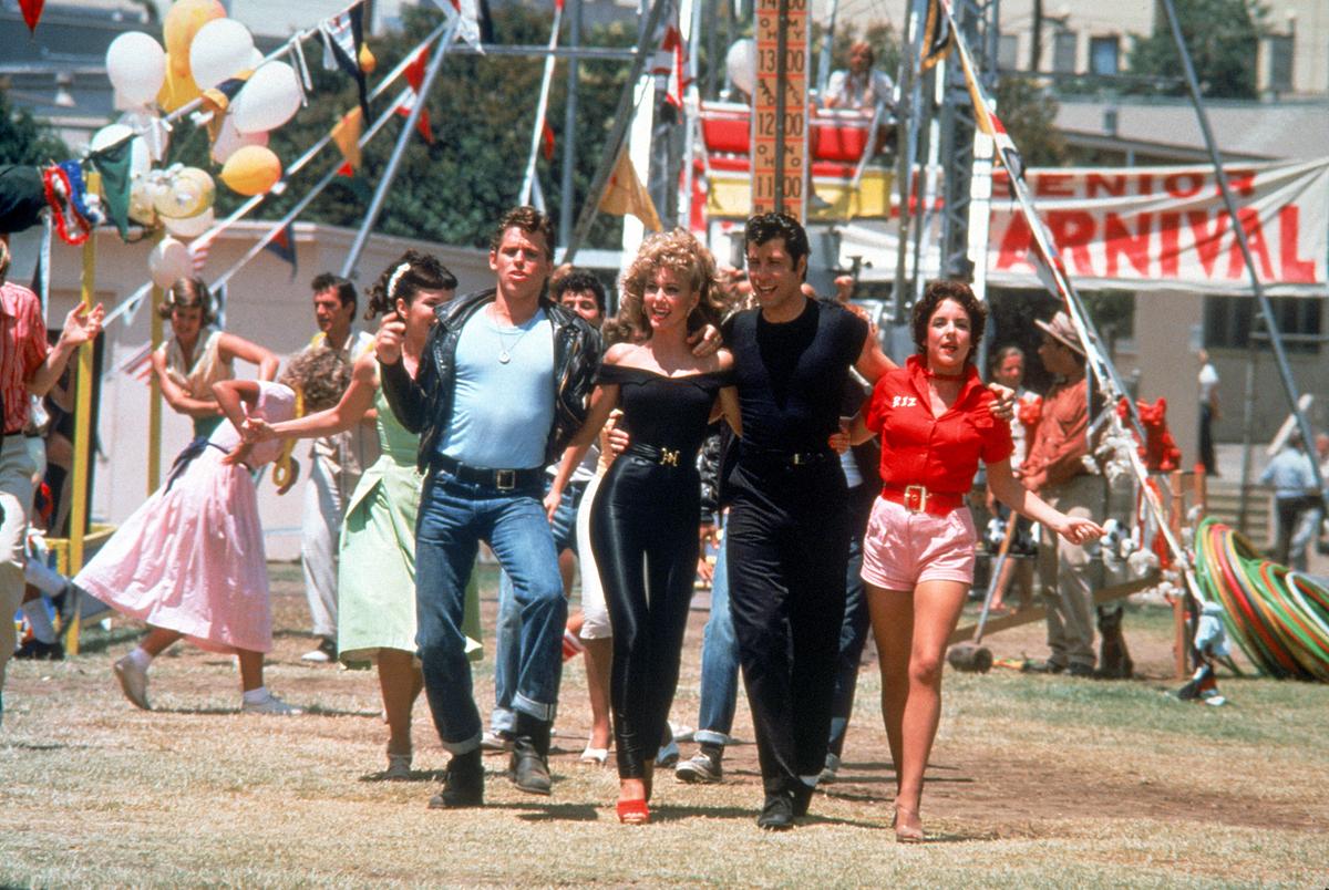 Im Bild: Jeff Conaway (Kenickie), Olivia Newton-John (Sandy), John Travolta (Danny), Stockard Channing (Rizzo).