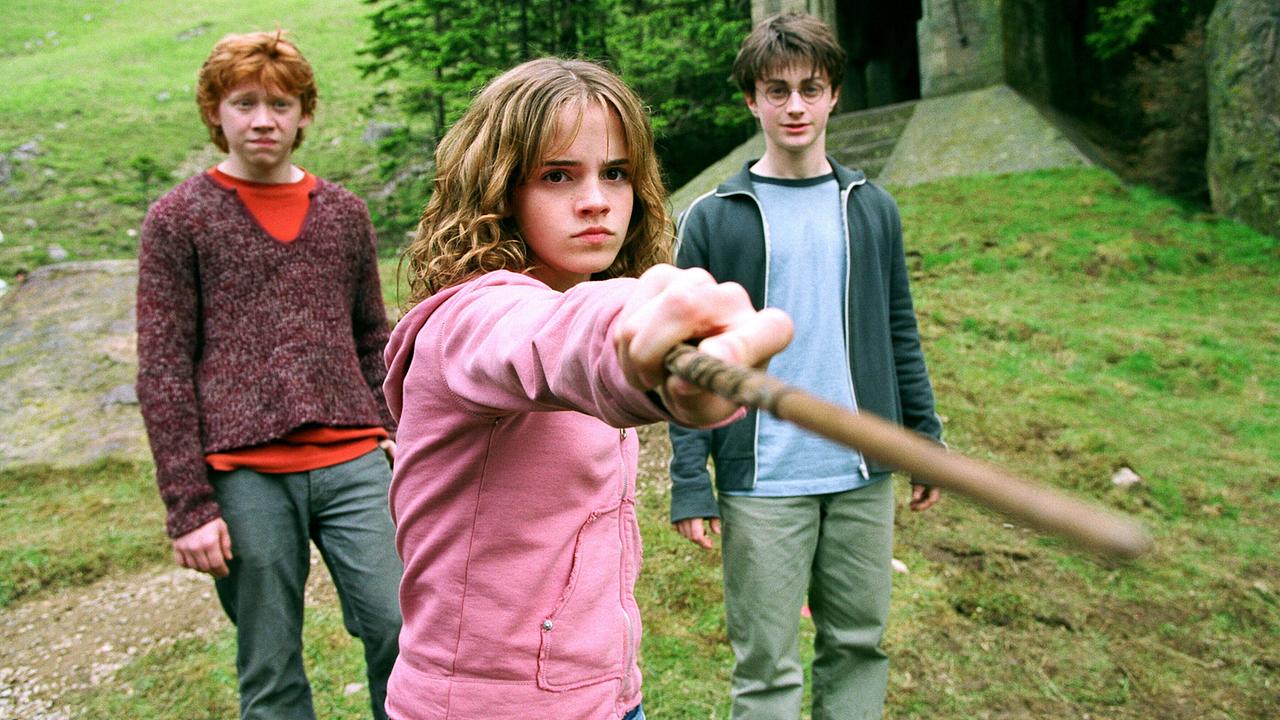 Rupert Grint (Ron Weasley), Emma Watson (Hermine Granger), Daniel Radcliffe (Harry Potter)