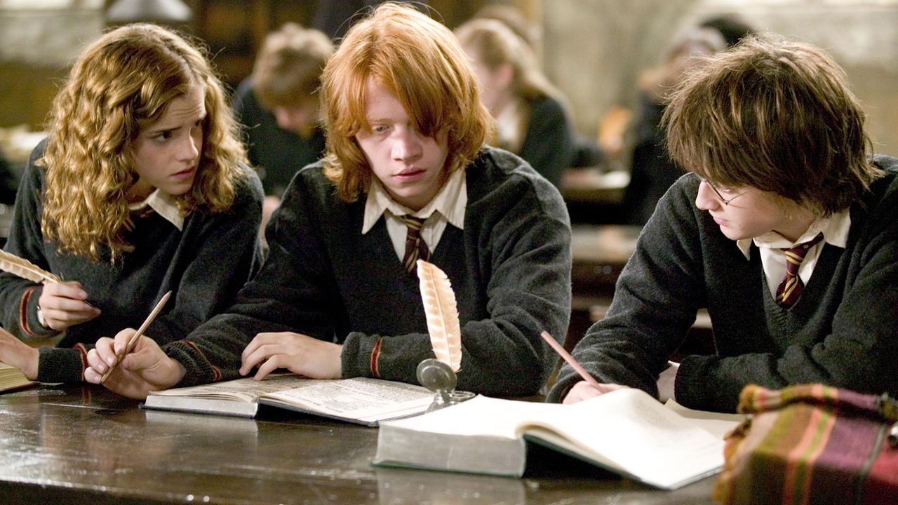 Emma Watson (Hermione Granger), Rupert Grint (Ron Weasley), Daniel Radcliffe (Harry Potter)