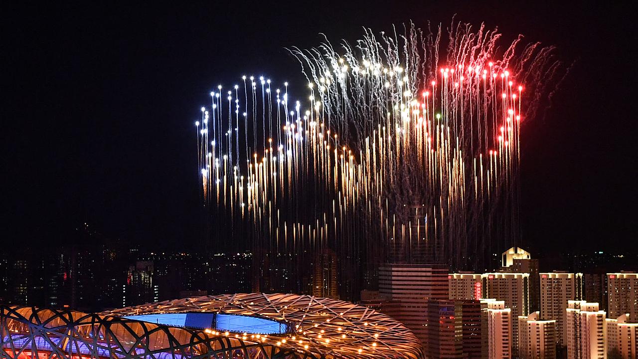 © APA/AFP/POOL/Li Xin Fireworks in the shape of the Olympic rings go off over the National Stadium, known as the Bird's Nest, in Beijing, during the opening ceremony of the Beijing 2022 Winter Olympic Games, on February 4, 2022.