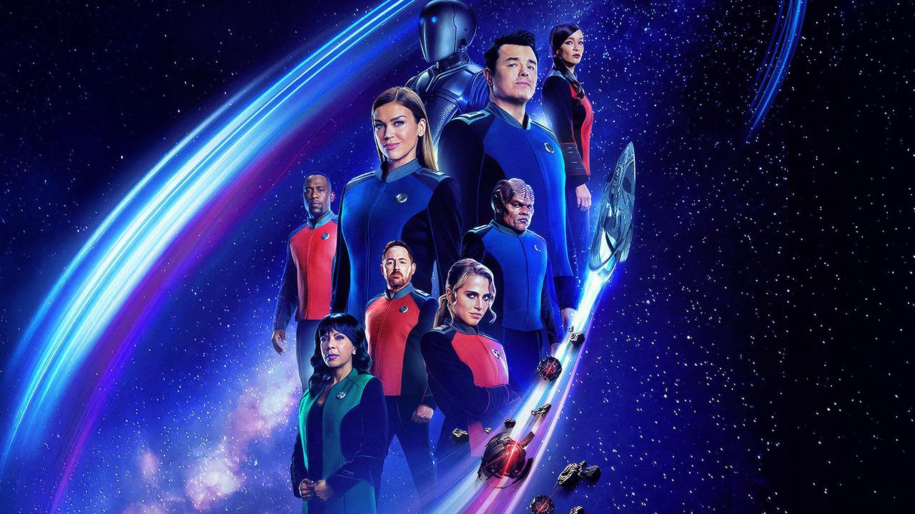 Fotomontage - die Crew der Orville in blauen, roten und grünen Uniformen, im Hintergrund Sterne im Weltall, ein Raumschiff zieht eine leuchtende Spur um die Gruppe