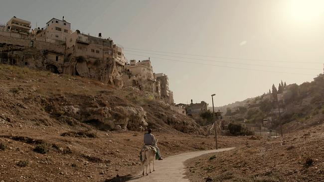 Nayef liefert in Silwan, einem Stadtteil von Ost-Jerusalem, den Bewohnern Lebensmittel mit dem Esel. Das hat seine Familie schon seit Generationen gemacht. 