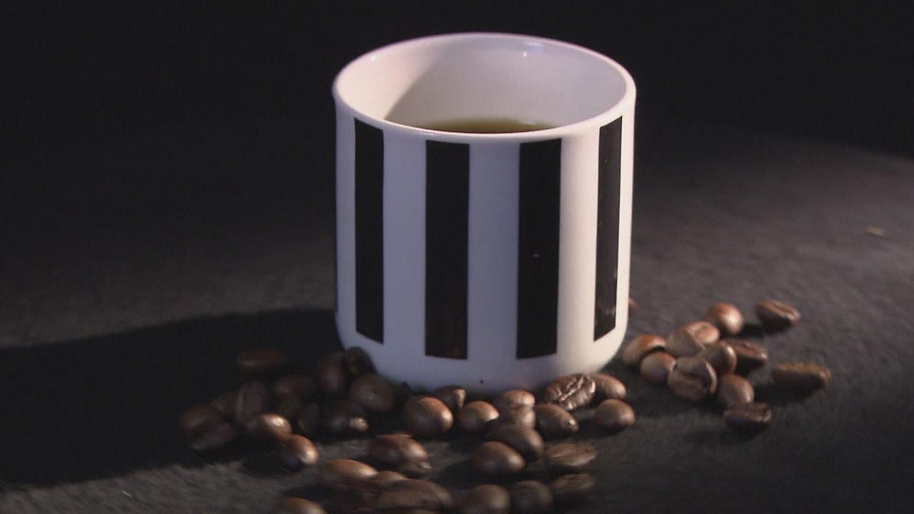 Kaffee Tasse mit Kaffeebohnen 
