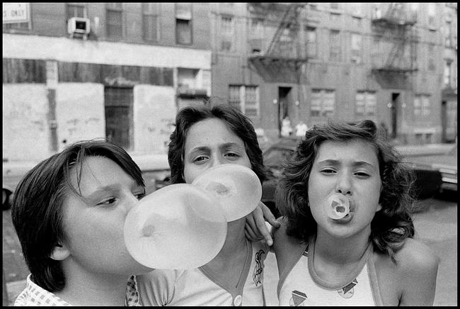 Susan Meiselas, Carol, JoJo and Lisa hanging out on Mott Street. Little Italy, New York City, USA, 1976