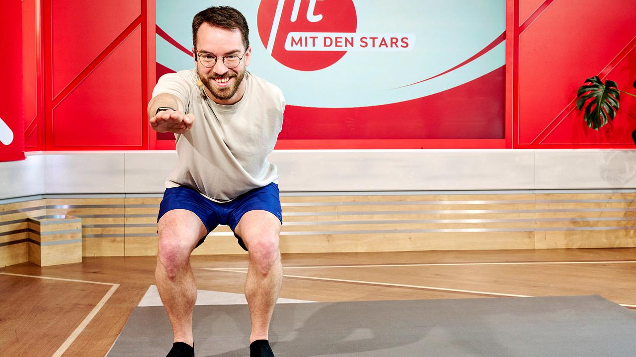 Andreas Onea macht eine Kniebeuge