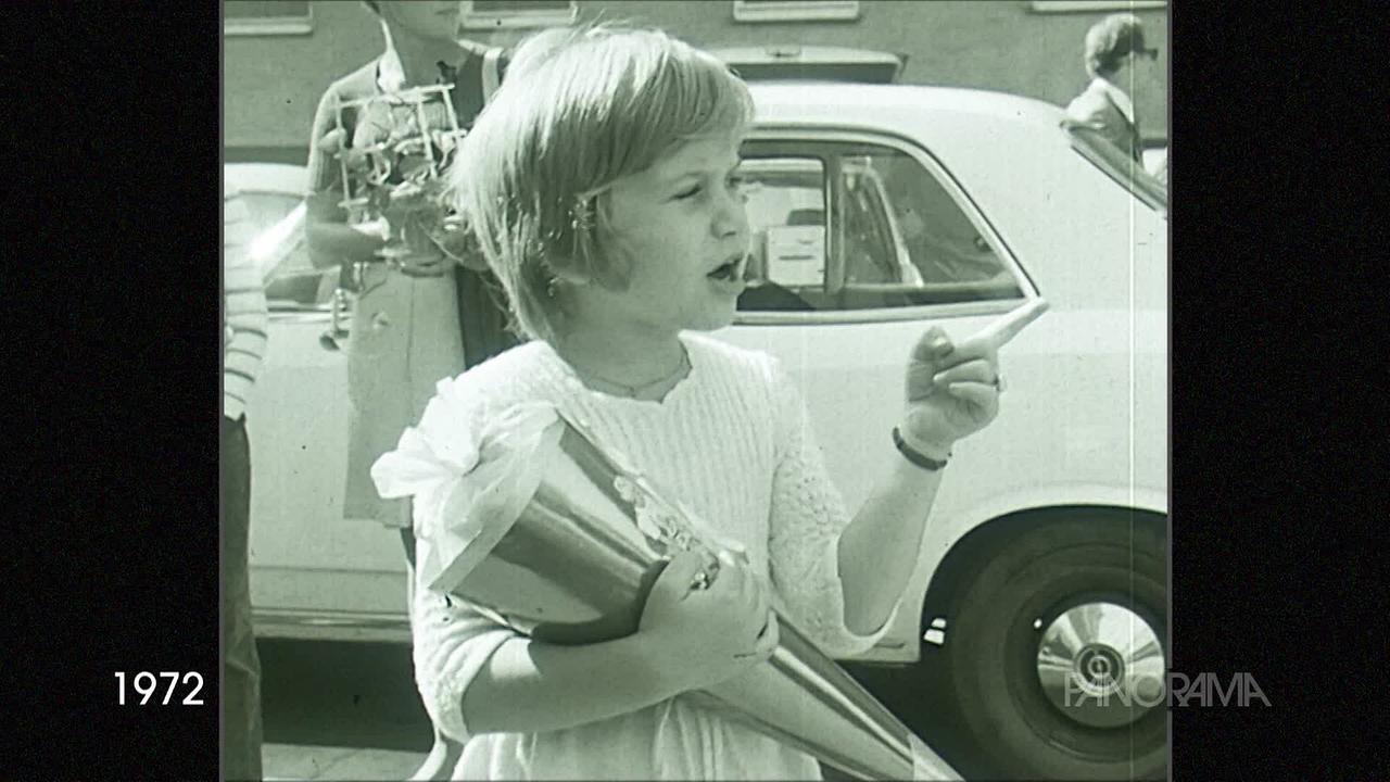 © ORF Am Bild aus dem Jahr 1972 ist ein Mädchen mit kurzen Haaren, die eine Schultüte trägt.