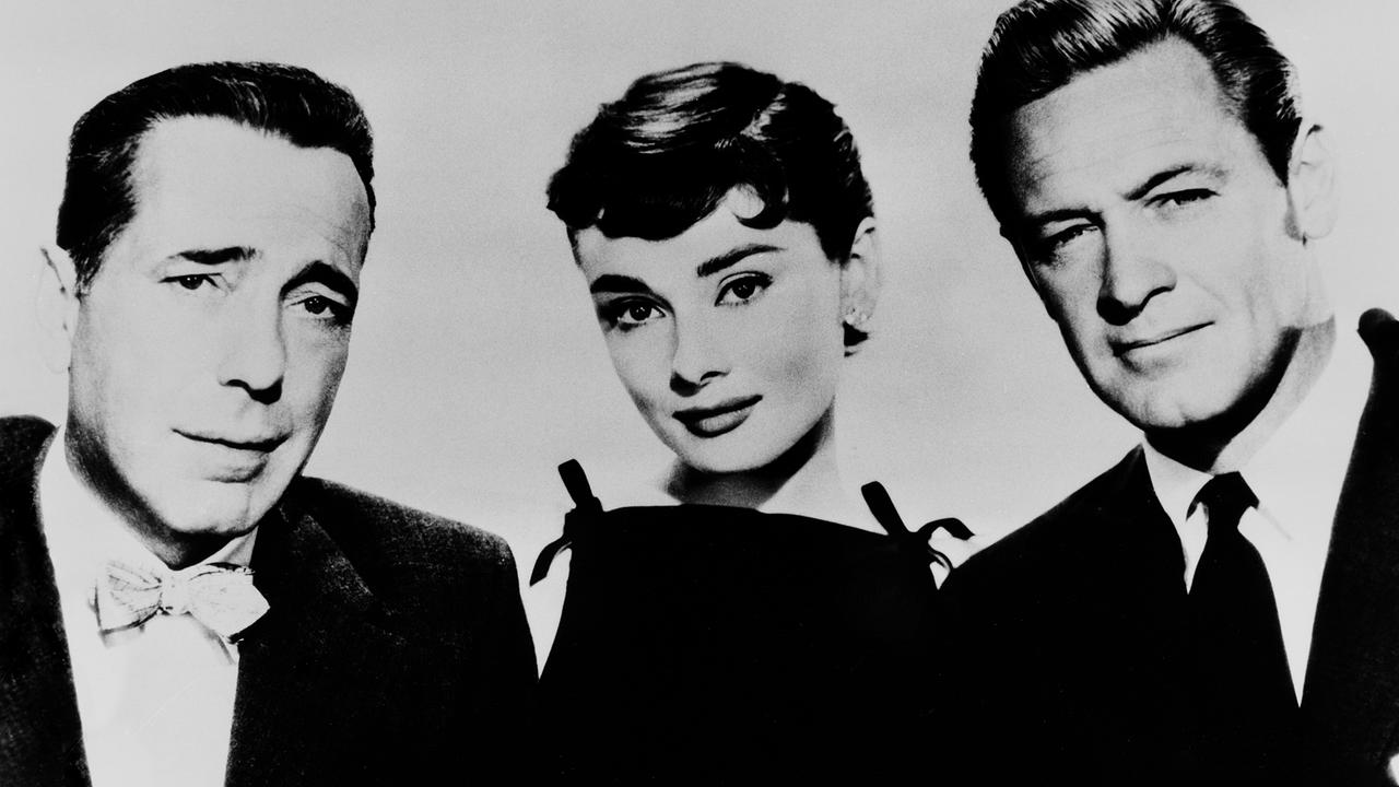 Im Bild: Humphrey Bogart (Linus Larrabee), Audrey Hepburn (Sabrina Fairchild), William Holden (David Larrabee).