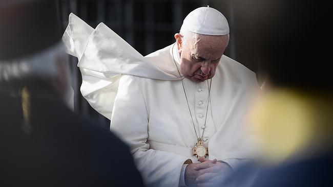 Pope Francis prays during a Prayer and Meeting for Peace, promoted by the Community of Sant’Egidio, on October 7, 2021 by the Colosseum monument in Rome