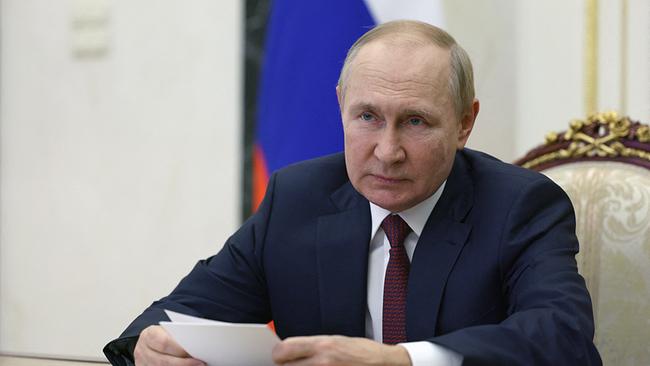Russian President Vladimir Putin chairs a meeting with intelligence chiefs of former Soviet countries via a video link in Moscow on September 29, 2022. President Putin said on September 29 that conflicts in countries of the former USSR, including Ukraine, are the result of the collapse of the Soviet Union.