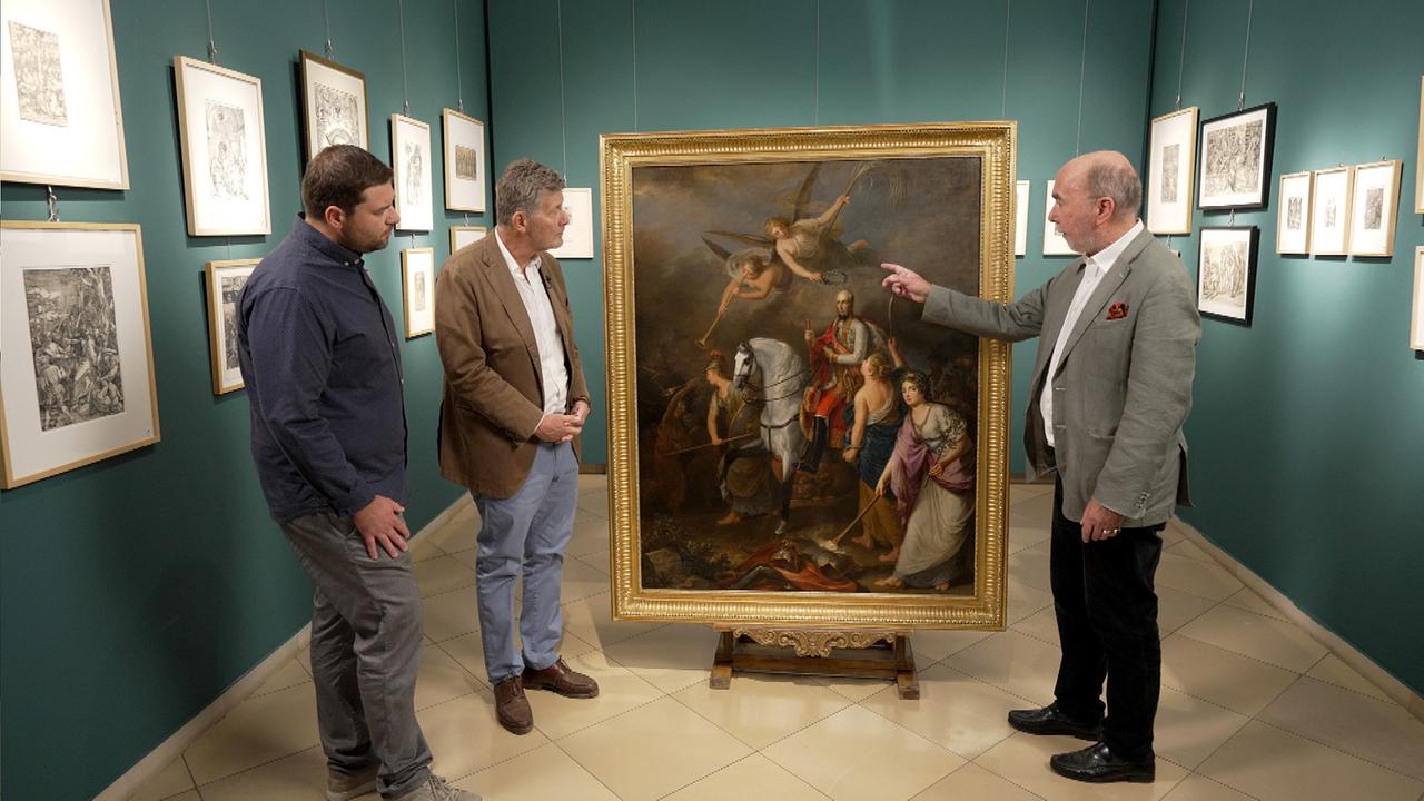 Ronald Graf, Karl Hohenlohe, Alexander Strasoldo begutachten ein Gemälde das Malers Ferracuti.