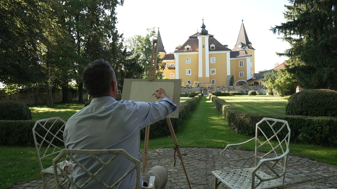 Johannes Würmer beim Malen seines Schlosses. 