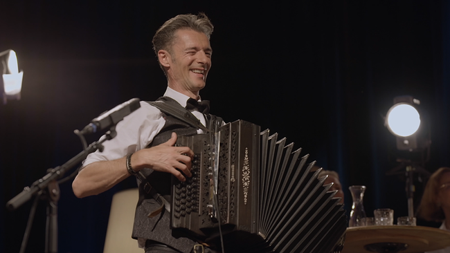 Ein Mann mit Ziehharmonika