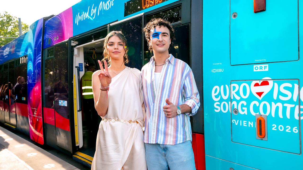 Luxembourg's ESC participant Eva Marija and COSMÓ pose in front of the "TANZSCHEIN" special tram to Stadthalle.