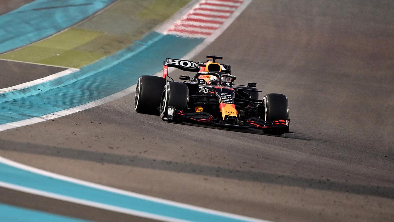 Red Bull's Dutch driver Max Verstappen drives at the Yas Marina Circuit during the Abu Dhabi Formula One Grand Prix on December 12, 2021. 