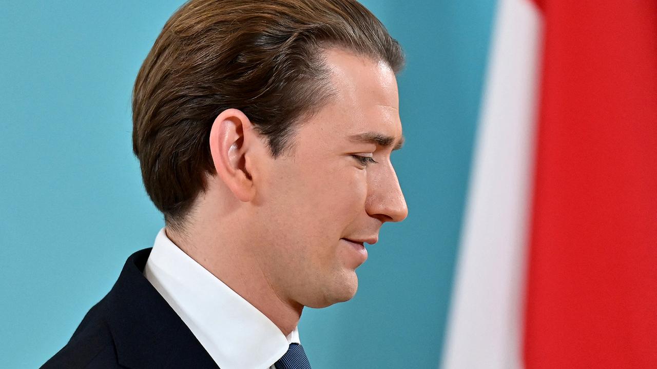 Former Austrian Chancellor Sebastian Kurz leaves after giving a press conference in Vienna, on December 2, 2021. Kurz, long hailed a political whizz kid until resigning after being implicated in a corruption investigation, announced he is leaving politics