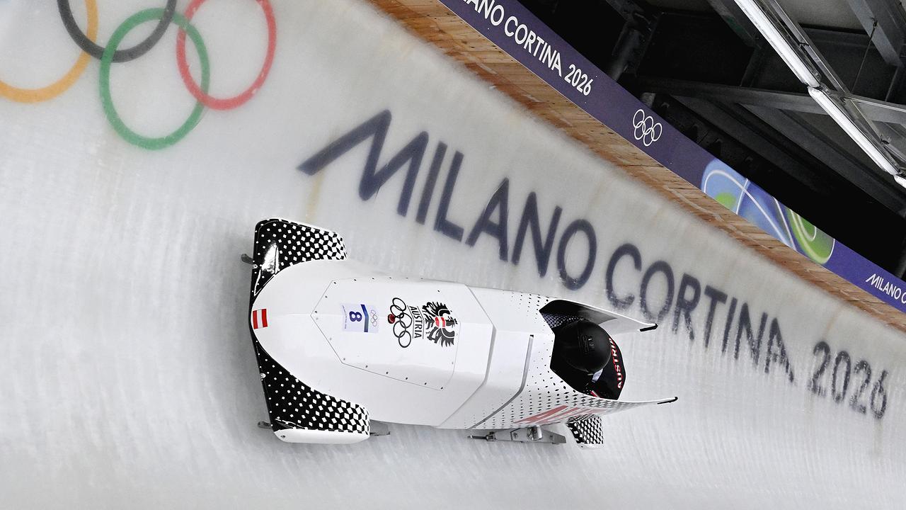 © APA/HANS KLAUS TECHT Markus Treichl und Daniel Bertschleram Montag, 16. Februar 2026, in Aktion im Eiskanal im 2. Lauf im Bob/Zweier in Cortina d'Ampezzo.
